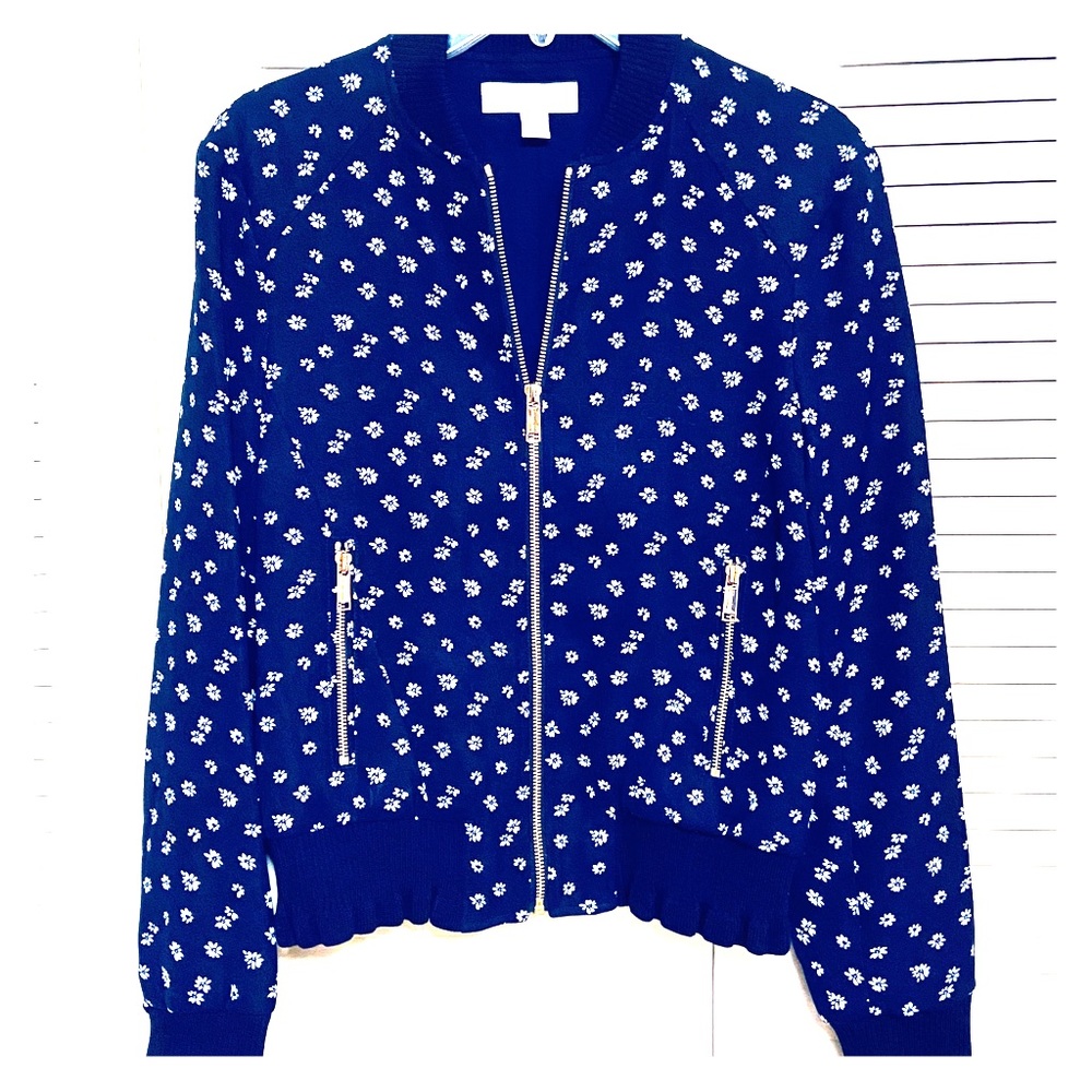 Zip up floral print jacket by Michael Kors.